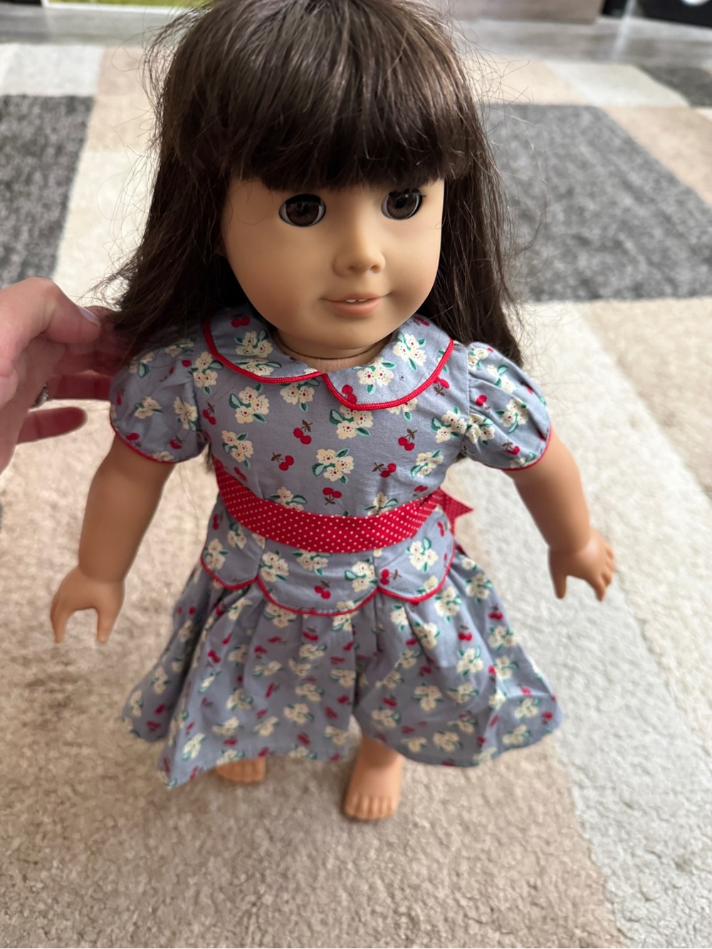 American Girl Samantha Parkington wearing the retired Floral “meet” Dress.